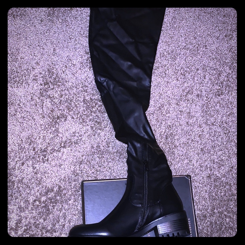 Thigh high black stretch flat boot